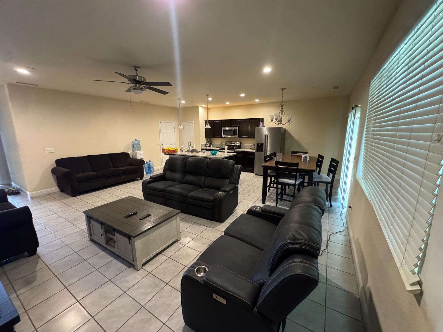 1726 Cleveland Street Selma, CA 93662 - Photo 3 of 17 a living room with furniture and a wooden floor