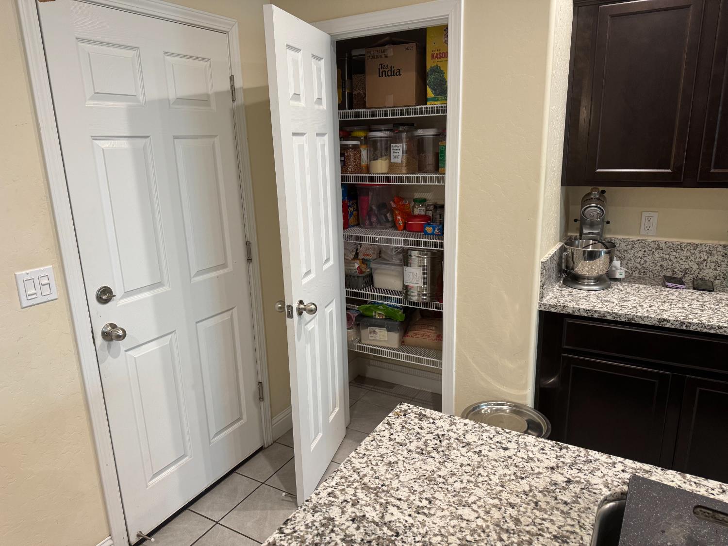 1726 Cleveland Street Selma, CA 93662 - Photo 5 of 17 a bedroom with a bed and a cabinets