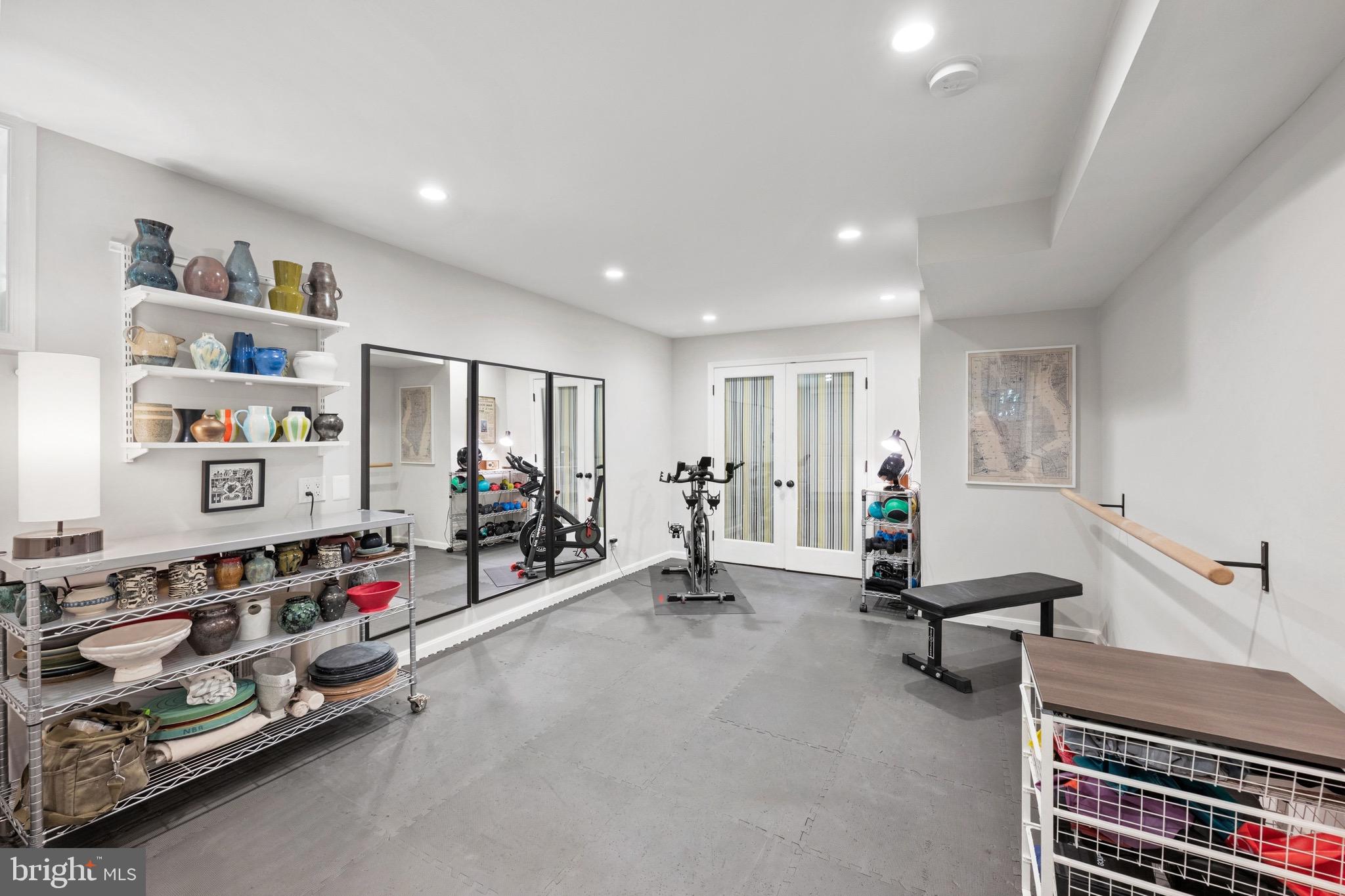 7409 Ridgewood Avenue Chevy Chase, MD 20815 - Photo 26 of 29 Home gym & storage room