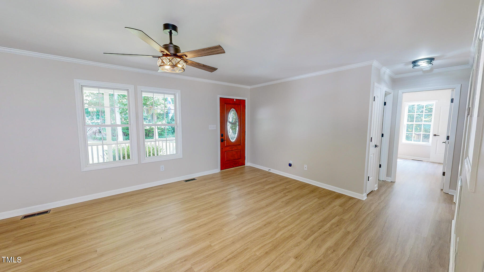 137 Dandelion Drive Timberlake, NC 27583 - Photo 16 of 53 wooden floor in an empty room with a window