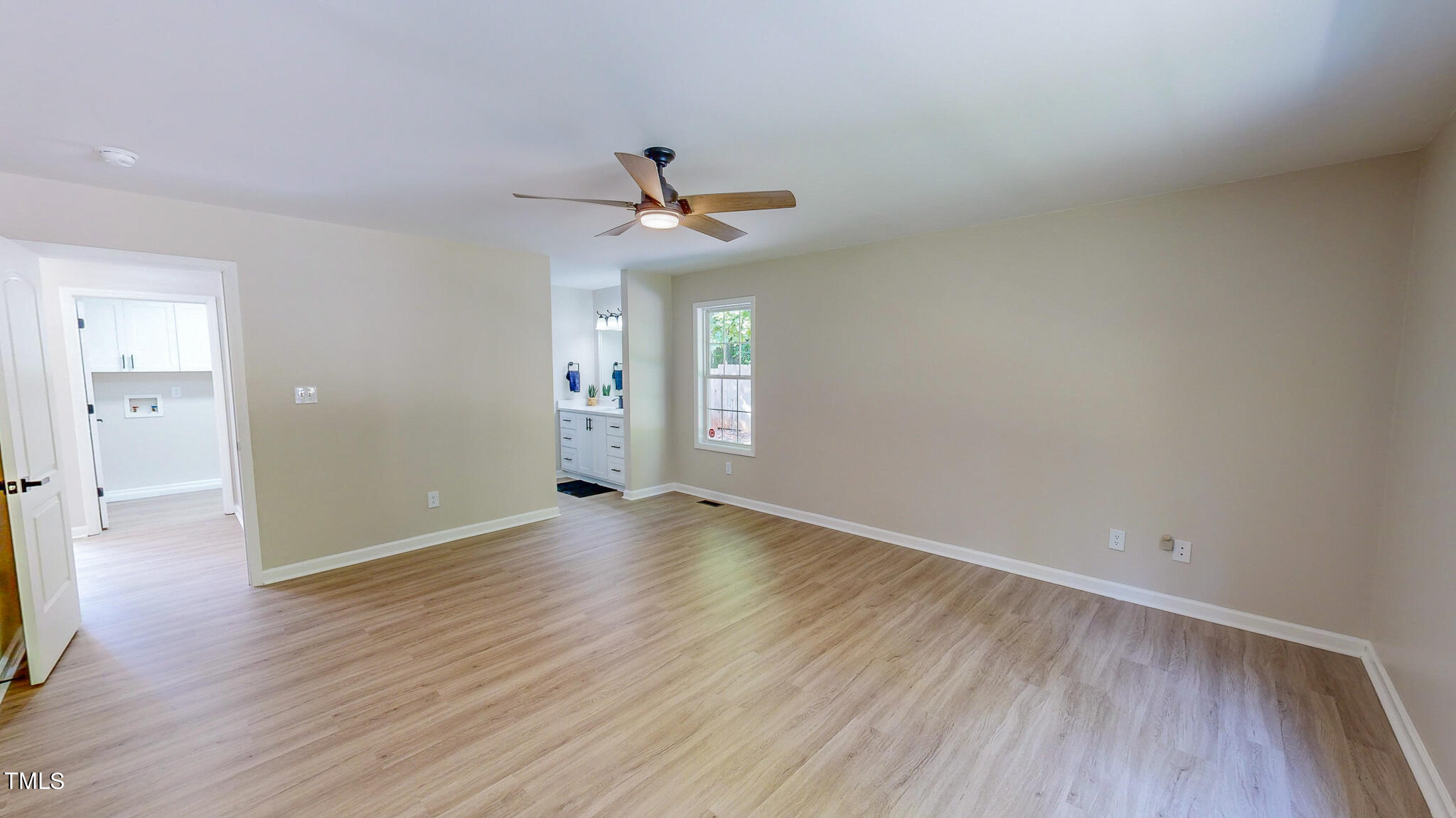 137 Dandelion Drive Timberlake, NC 27583 - Photo 24 of 53 wooden floor in an empty room with a window