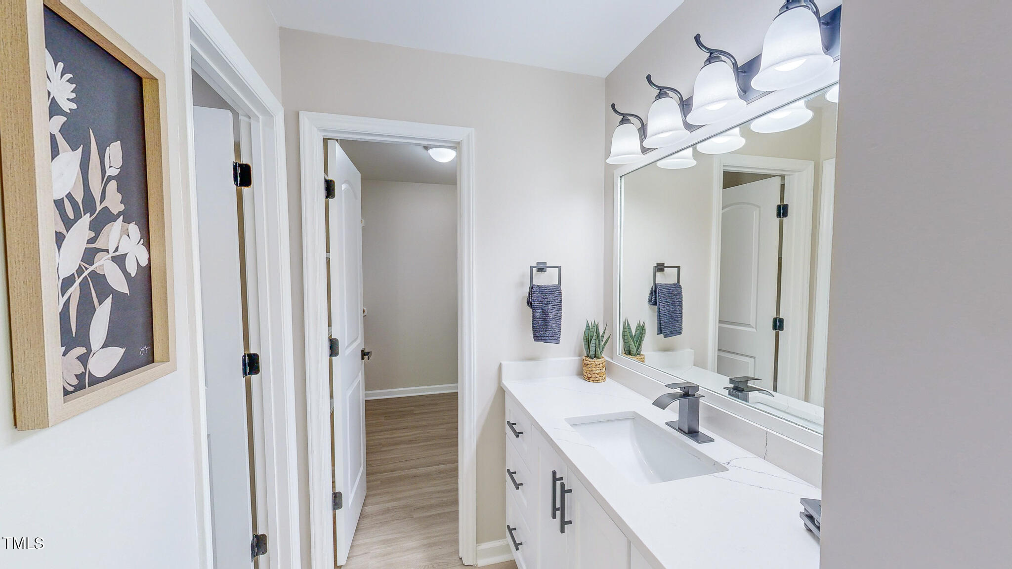 137 Dandelion Drive Timberlake, NC 27583 - Photo 26 of 53 a bathroom with a double vanity sink mirror and