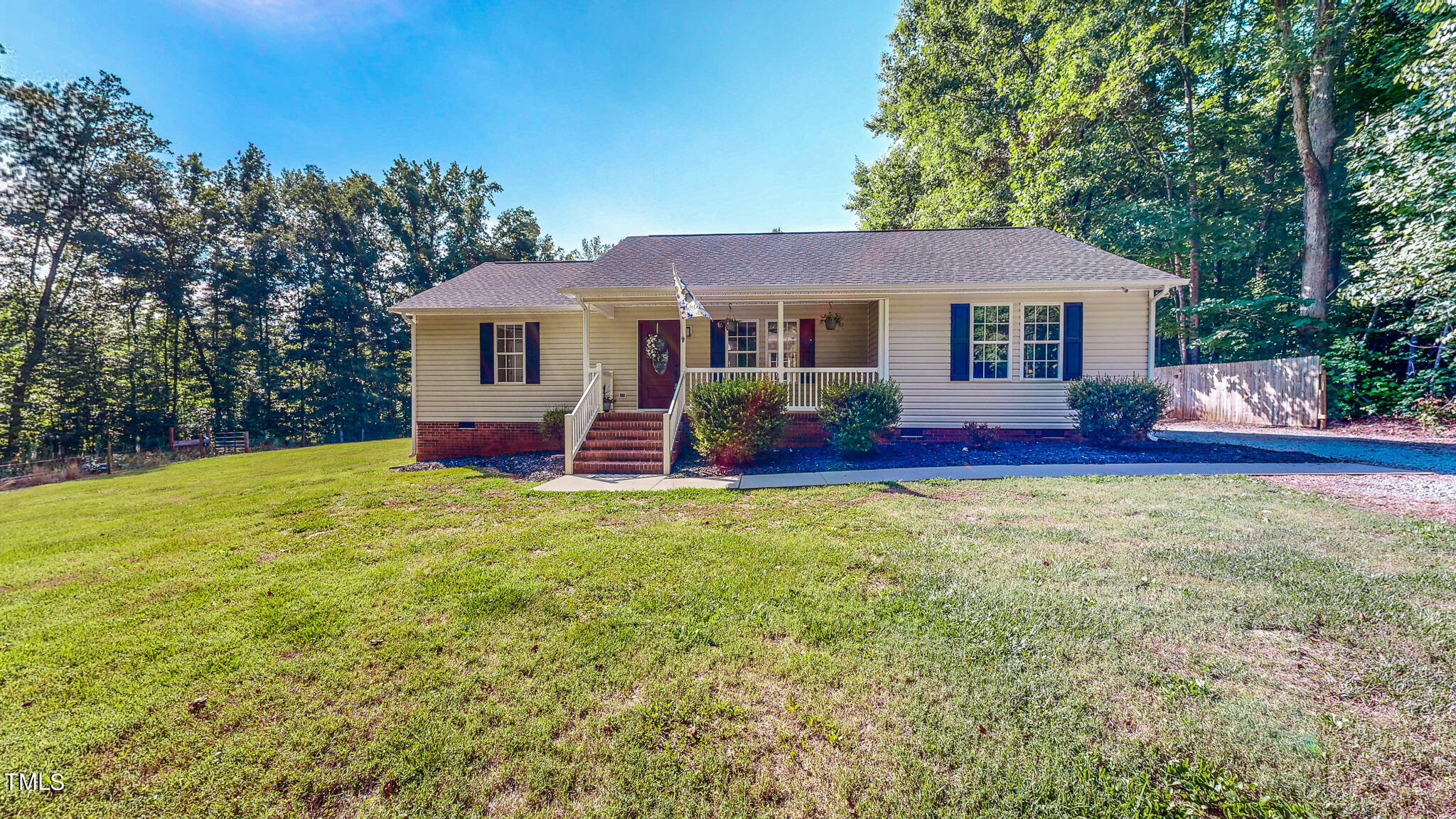 137 Dandelion Drive Timberlake, NC 27583 - Photo 42 of 53 a view of outdoor space yard and front view of house