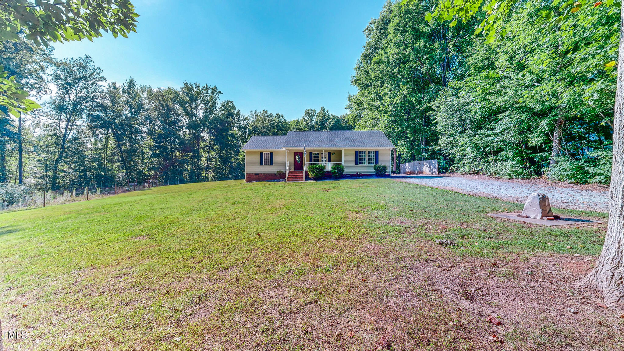 137 Dandelion Drive Timberlake, NC 27583 - Photo 43 of 53 a view of a house with a yard