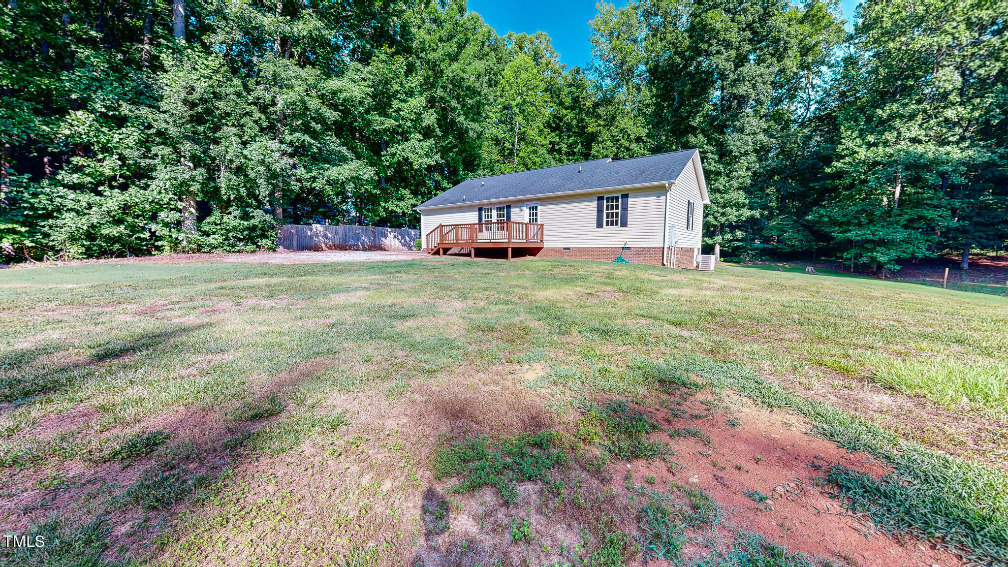 137 Dandelion Drive Timberlake, NC 27583 - Photo 45 of 53 a view of a house with a yard