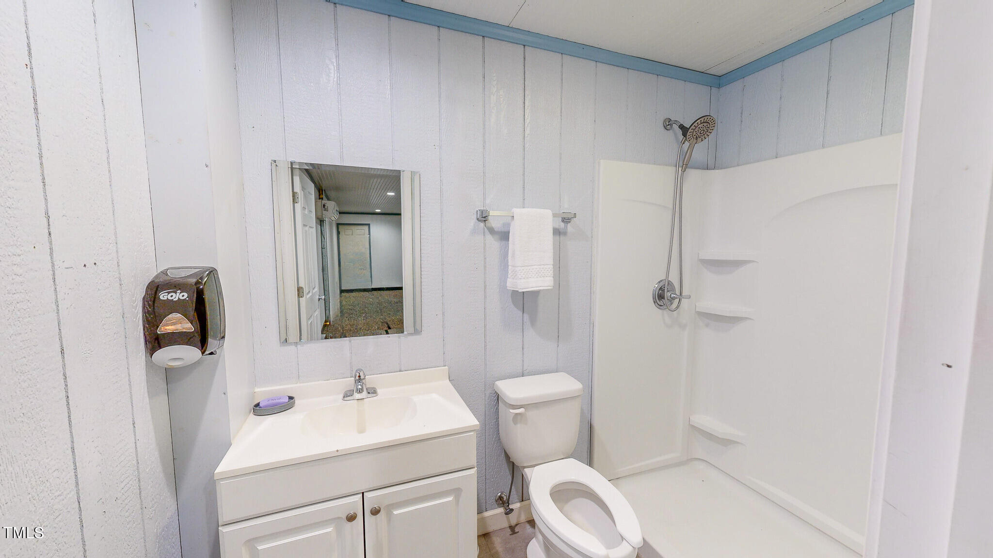 137 Dandelion Drive Timberlake, NC 27583 - Photo 47 of 53 a bathroom with a sink toilet and shower