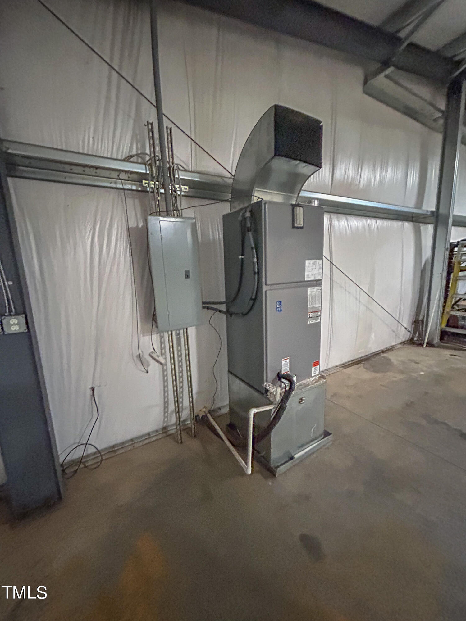 137 Dandelion Drive Timberlake, NC 27583 - Photo 52 of 53 a room with gym equipment and shower