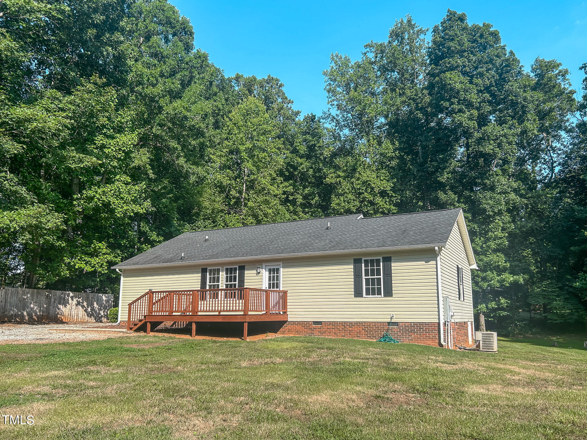 137 Dandelion Drive Timberlake, NC 27583 - Photo 9 of 53 a house that has a big yard