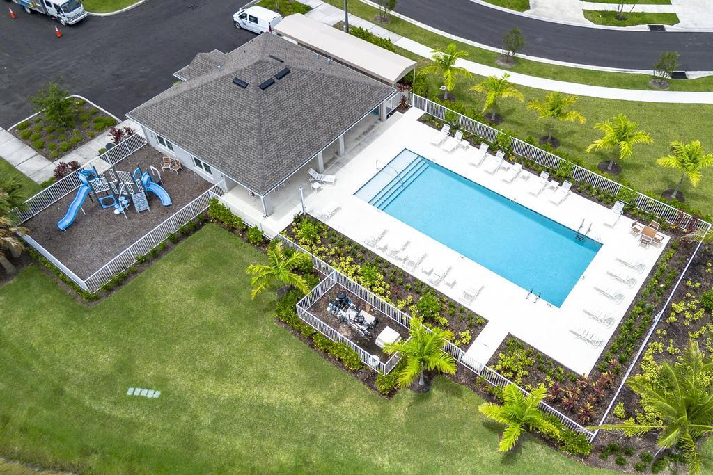 252 Raspberry Road Fort Pierce, FL 34981 - Photo 61 of 66 an aerial view of a house