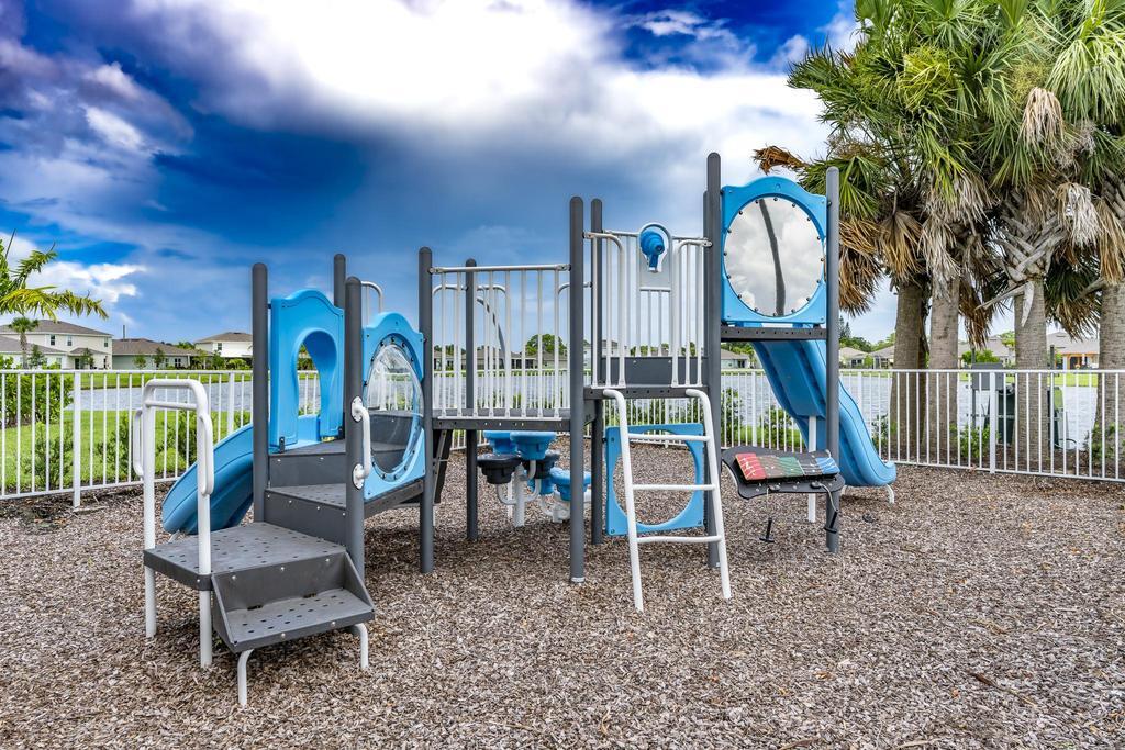 252 Raspberry Road Fort Pierce, FL 34981 - Photo 64 of 66 a view of outdoor space with seating