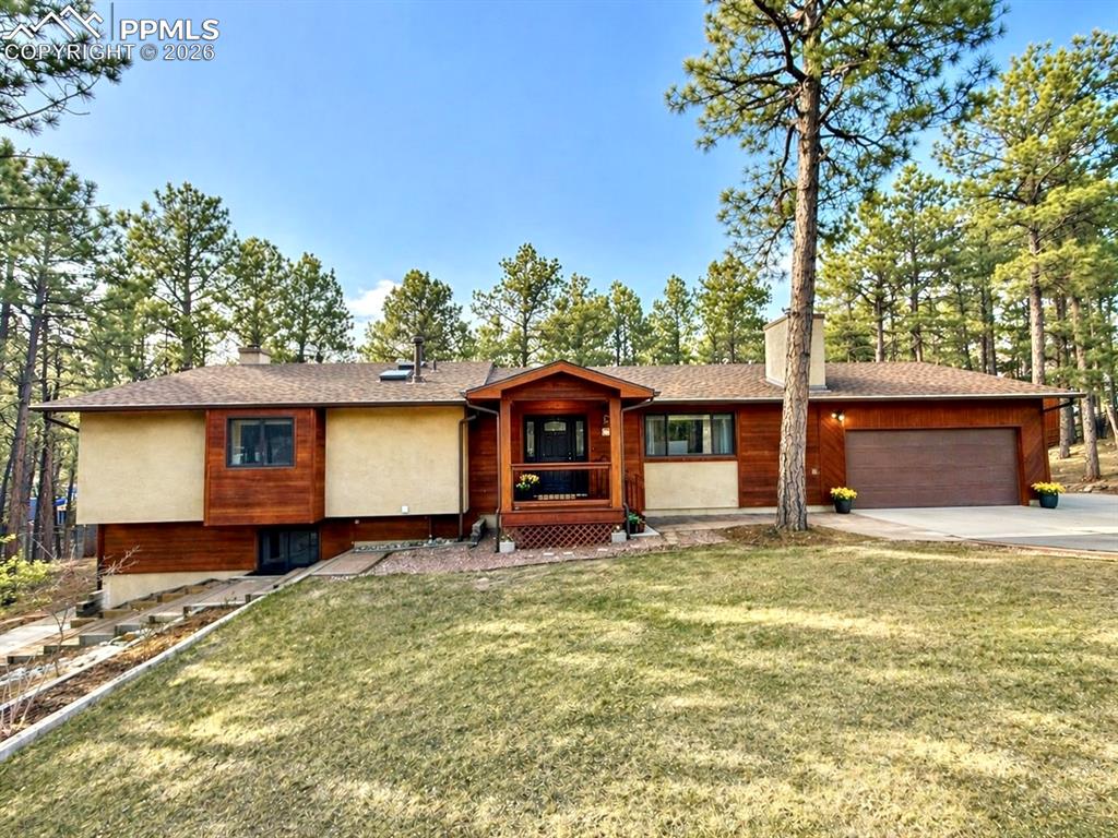 1060 Pleasant View Lane Colorado Springs, CO 80921 - Photo 42 of 48 a house view with a outdoor space