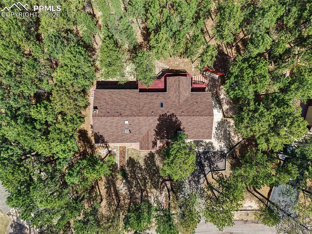 1060 Pleasant View Lane Colorado Springs, CO 80921 - Photo 47 of 48 an aerial view of a house with a yard
