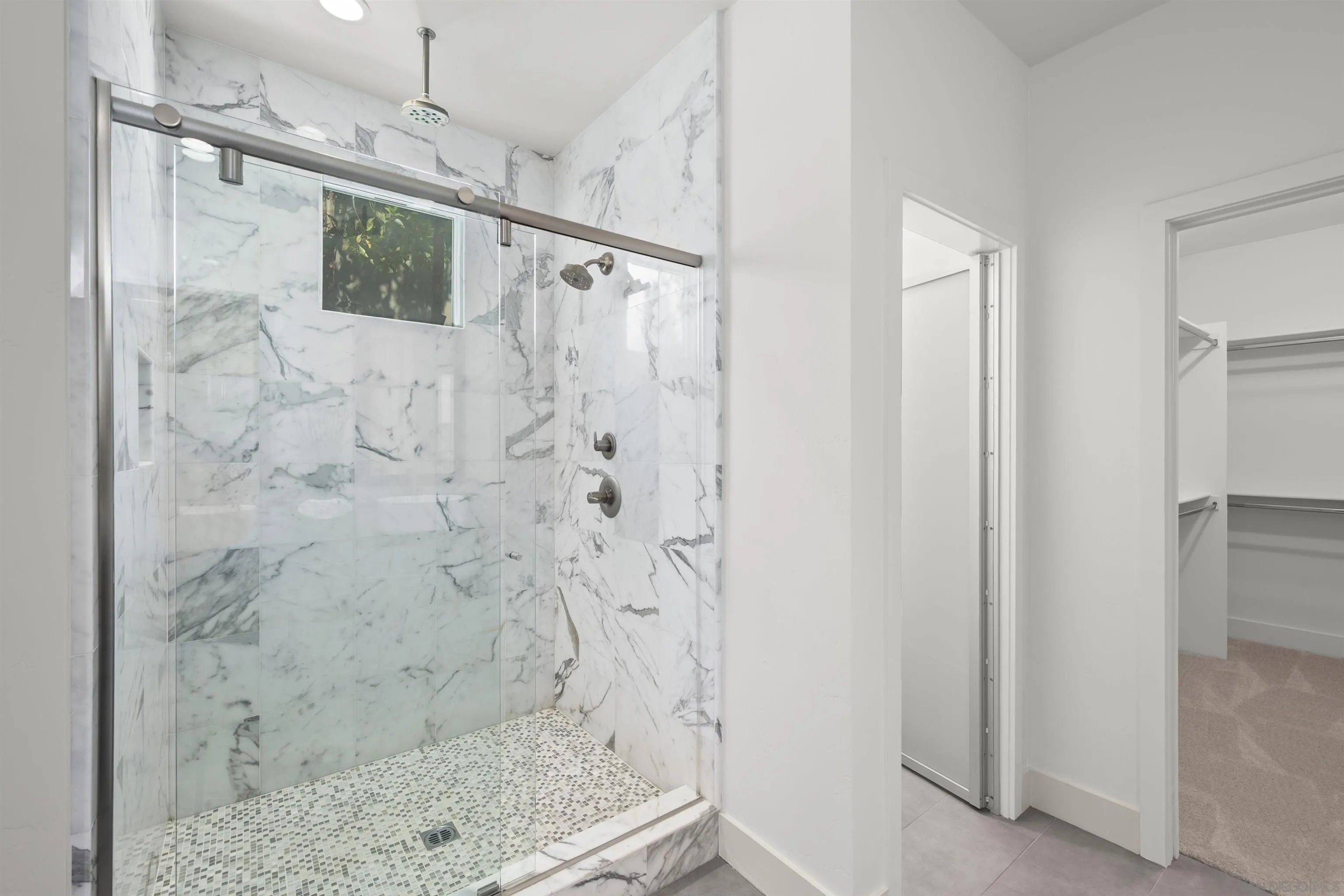 7853 Inception Way San Diego, CA 92108 - Photo 32 of 66 a bathroom with a shower