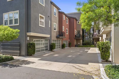 a view of a swimming pool with a table and chairs