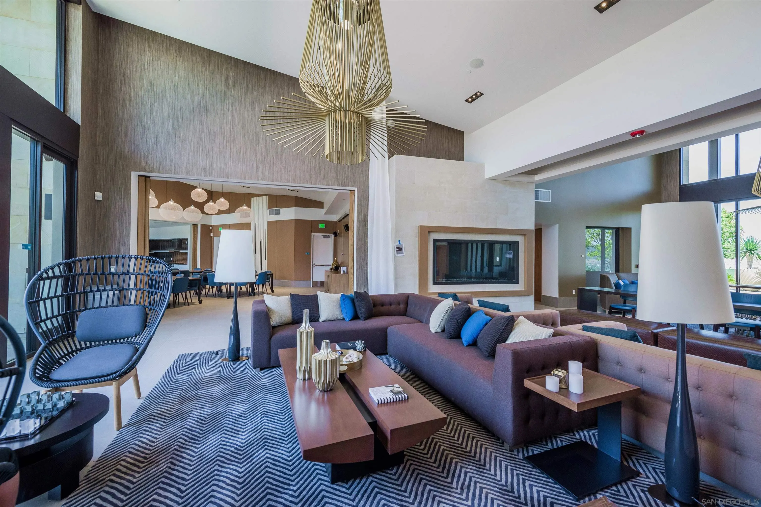 7853 Inception Way San Diego, CA 92108 - Photo 50 of 66 a living room with furniture and a flat screen tv