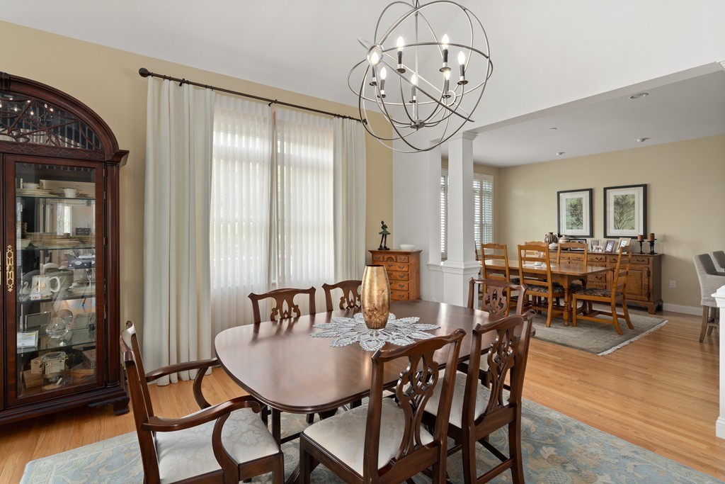 21 South Cottage Road, Unit 21 Belmont, MA 02478 - Photo 11 of 27 a view of a dining room with furniture window and wooden floor