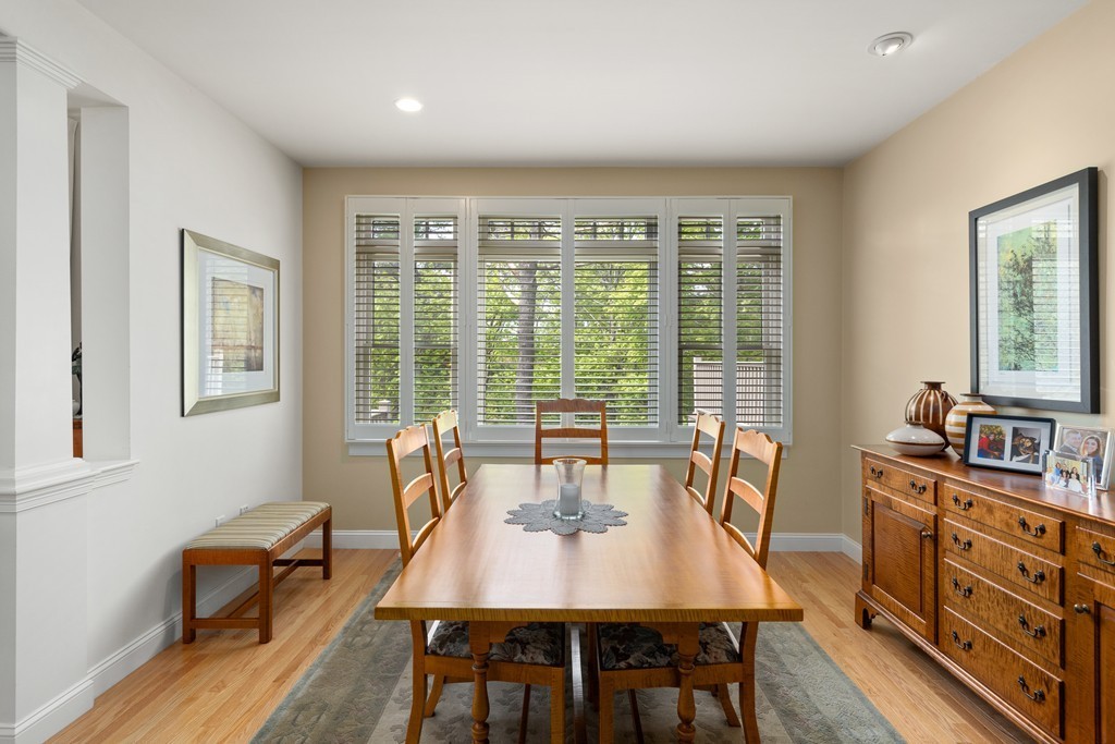 21 South Cottage Road, Unit 21 Belmont, MA 02478 - Photo 12 of 27 a view of a dining room with furniture window and wooden floor