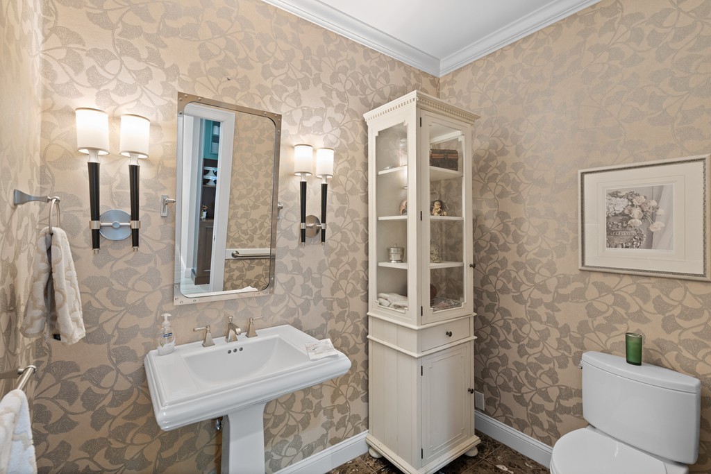 21 South Cottage Road, Unit 21 Belmont, MA 02478 - Photo 18 of 27 a bathroom with a sink toilet and shower