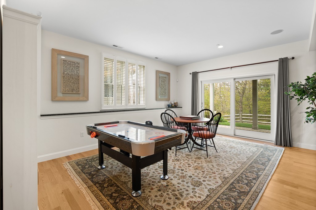 21 South Cottage Road, Unit 21 Belmont, MA 02478 - Photo 22 of 27 a living room with furniture a rug and a large window