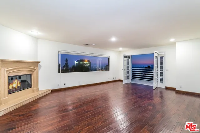 a bathroom with a tub and shower