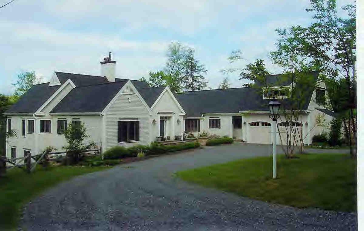 56 Elephant Rock Road Monterey, MA 01245 - Photo 1 of 9 a front view of a house with a yard