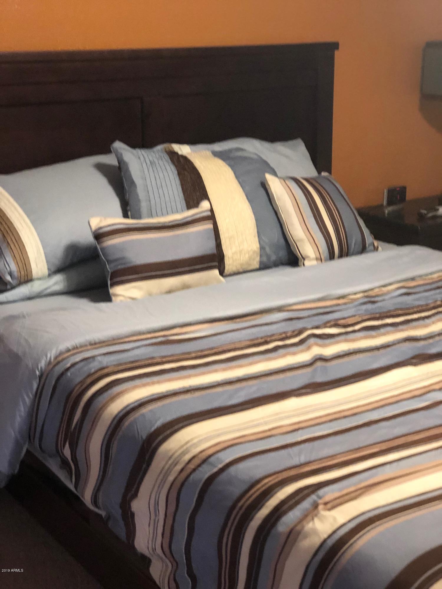 7910 East Thomas Road, Unit 226 Scottsdale, AZ 85251 - Photo 10 of 18 a view of bed and pillows