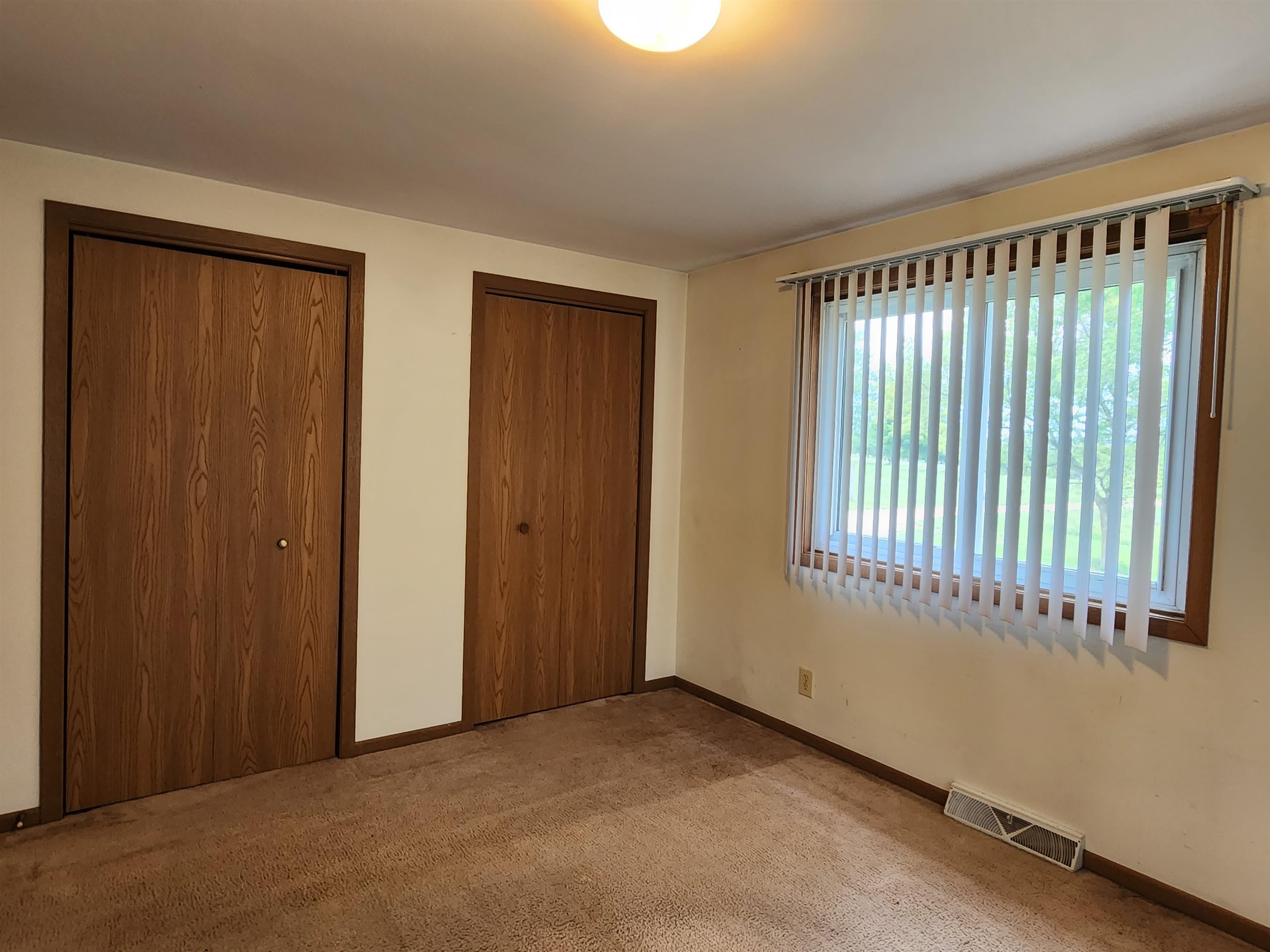 3443 Eddie Road Winnebago, IL 61088 - Photo 14 of 29 a view of an empty room with a window