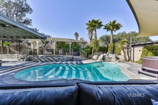 1213 Carolyn Street Ridgecrest, CA 93555 - Photo 45 of 50 a view of a swimming pool with a patio