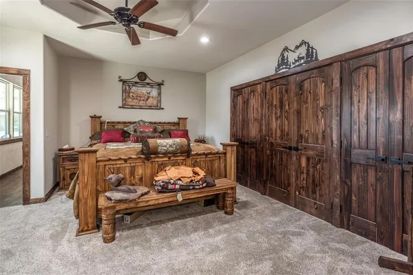 a bed room with a bed and a window