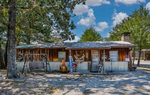 a view of outdoor space with seating area and barbeque oven