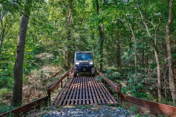 a view of balcony with wooden floor