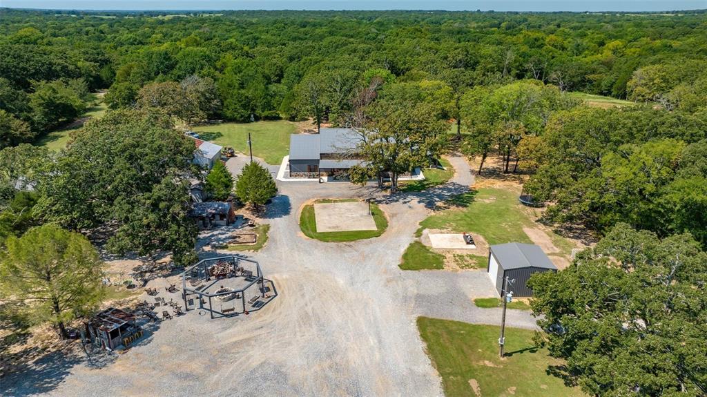 240 Magnolia Lane Bennington, OK 74723 - Photo 38 of 39 an aerial view of a house with yard swimming pool and outdoor seating