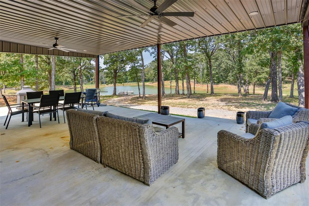 240 Magnolia Lane Bennington, OK 74723 - Photo 9 of 39 an outdoor living space with patio furniture and garden view