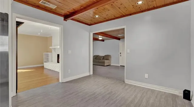 wooden floor in a hall with an entryway