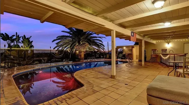a view of a chairs and tables in patio