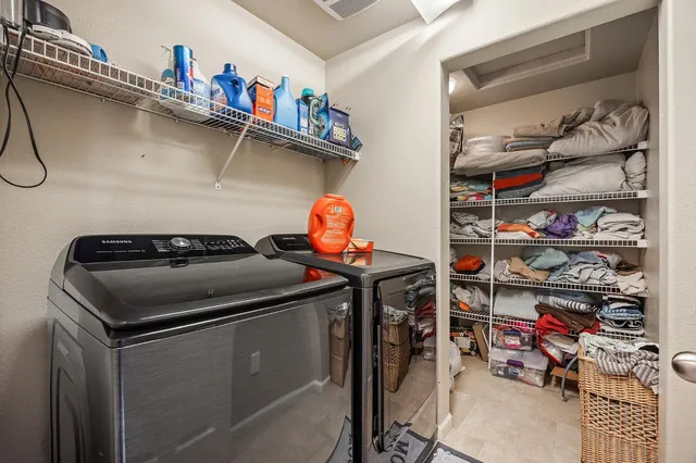 a utility room with dryer and washer