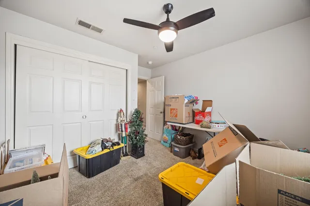 a room with furniture and workspace