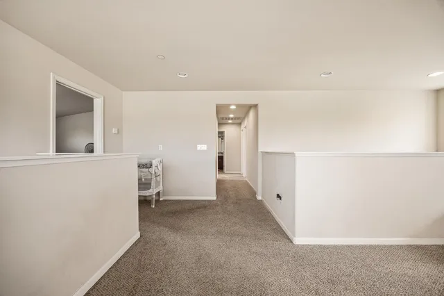 a view of a livingroom with furniture