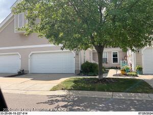 2415 North Aurelius Road, Unit 14 Holt, MI 48842 - Photo 1 of 29 Front of condo