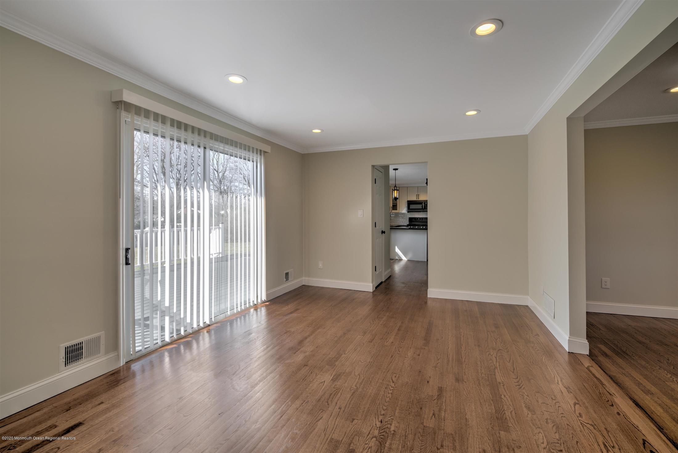 518 East Freehold Road Freehold, NJ 07728 - Photo 15 of 35 wooden floor in an empty room with a window