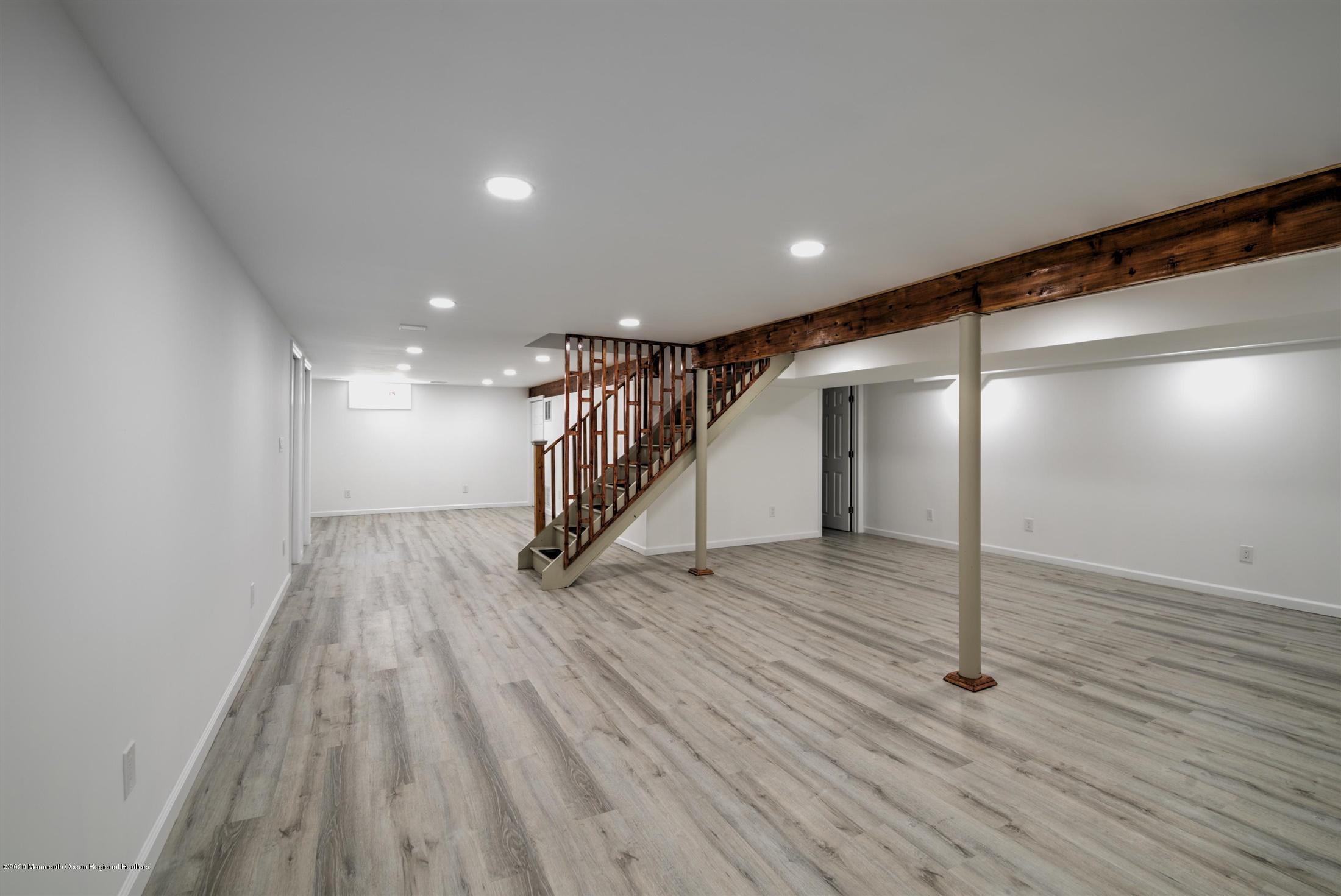 518 East Freehold Road Freehold, NJ 07728 - Photo 29 of 35 a view of empty room with wooden floor