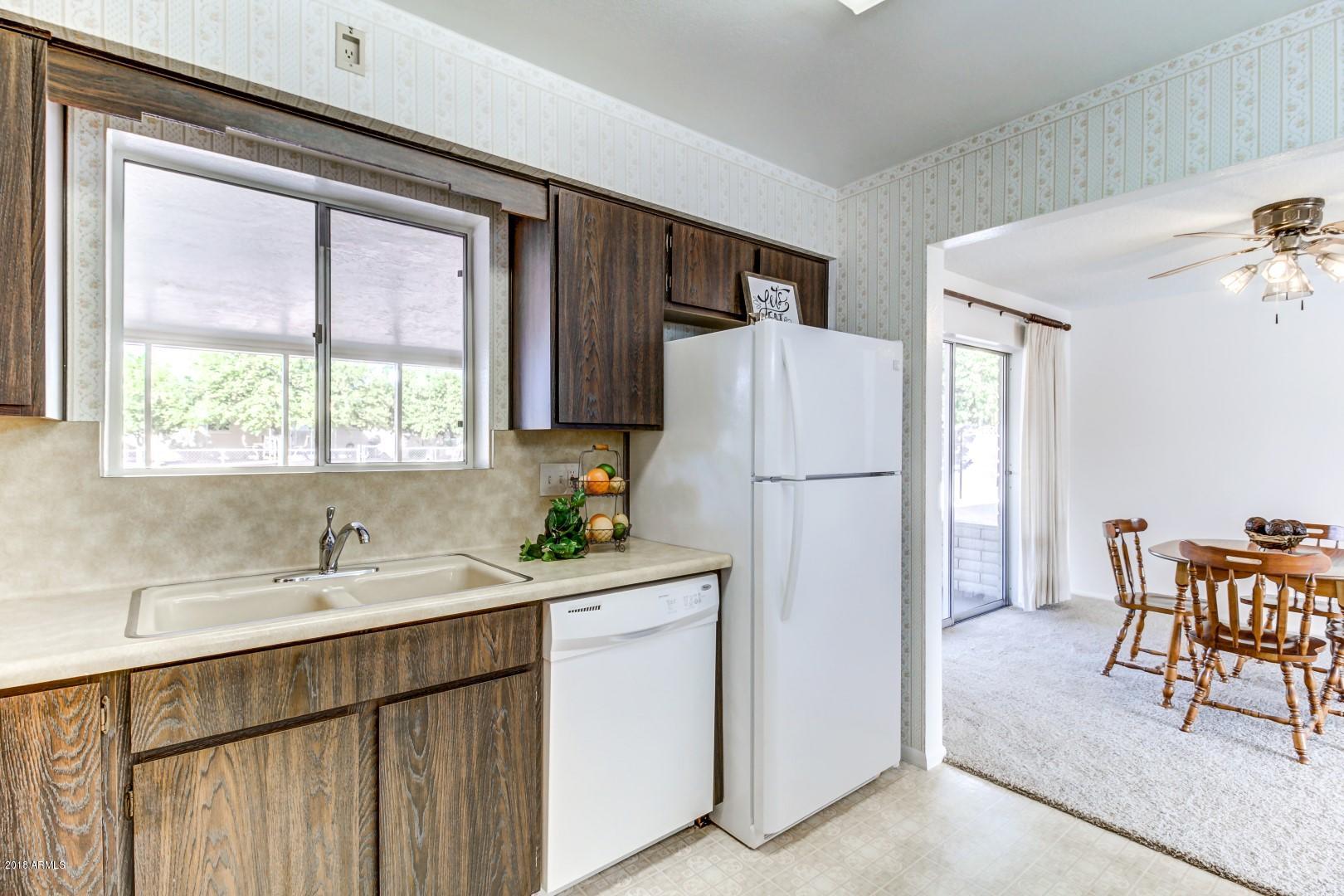 6664 East Decatur Street Mesa, AZ 85205 - Photo 8 of 44 Kitchen opens to the dining area