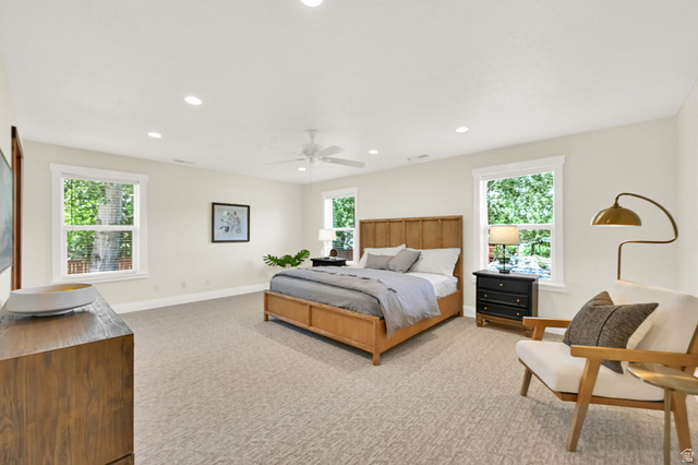 13658 South Fort Street Draper, UT 84020 - Photo 23 of 87 Spacious room featuring carpeting, recessed lighting, a ceiling fan, and multiple windows with white trim