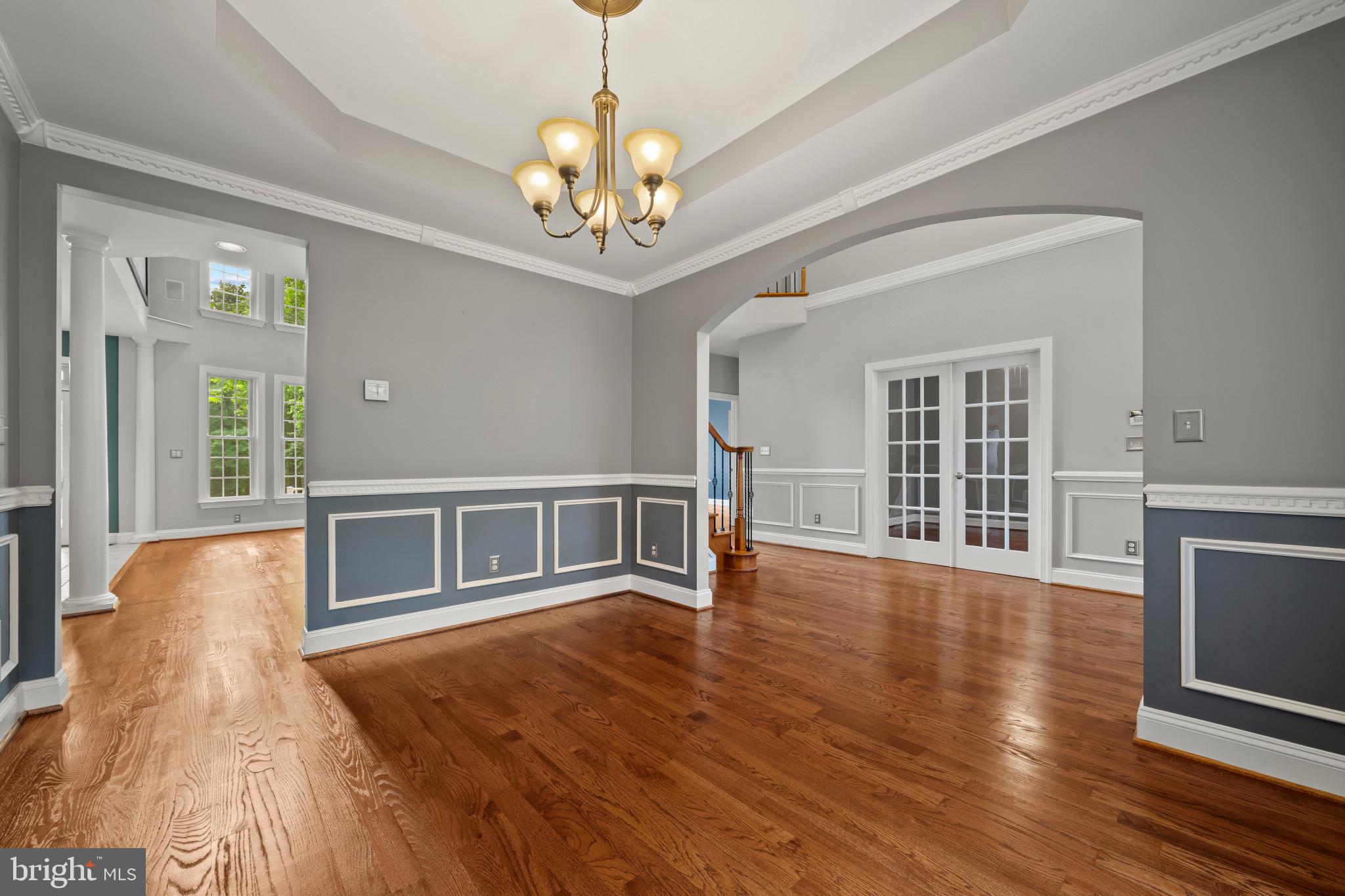 12221 Jerusalem Road Kingsville, MD 21087 - Photo 15 of 66 a view of a livingroom with wooden floor and large windows