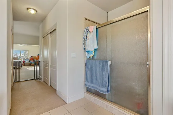 a view of hallway with washer and dryer
