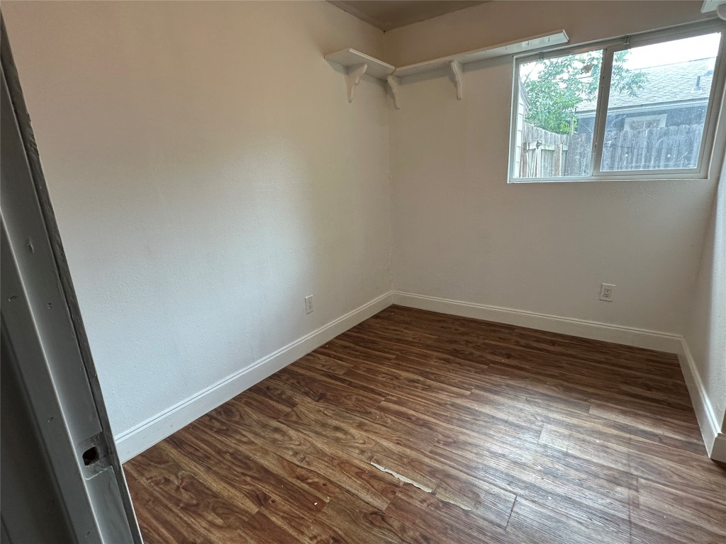 6004 Palm Circle Austin, TX 78741 - Photo 19 of 27 a view of a room with wooden floor and window