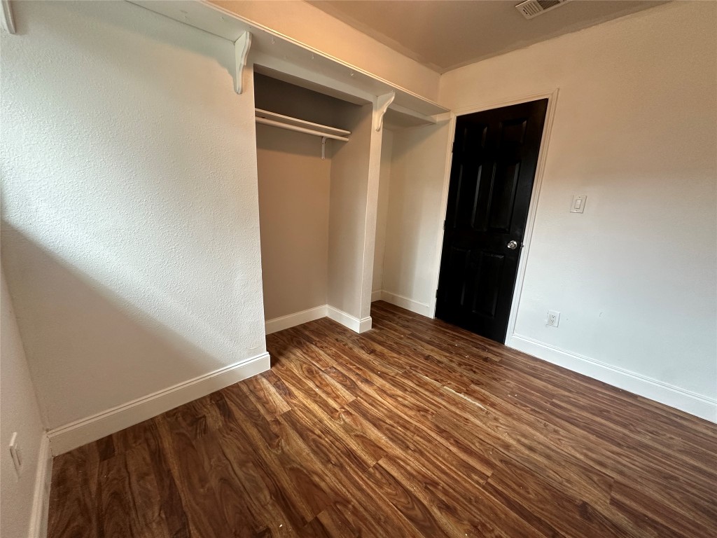 6004 Palm Circle Austin, TX 78741 - Photo 20 of 27 a view of empty room with wooden floor