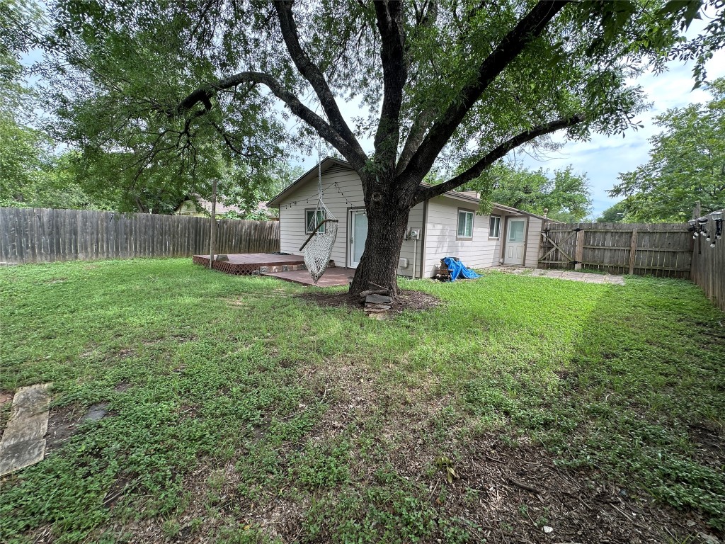 6004 Palm Circle Austin, TX 78741 - Photo 26 of 27 a view of a tree in a backyard of a house