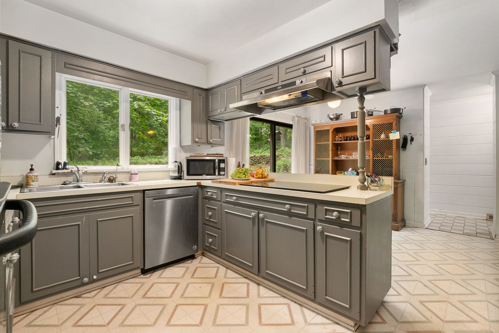 36W525 Wild Rose Road St. Charles, IL 60174 - Photo 7 of 39 a kitchen with stainless steel appliances granite countertop a sink and cabinets