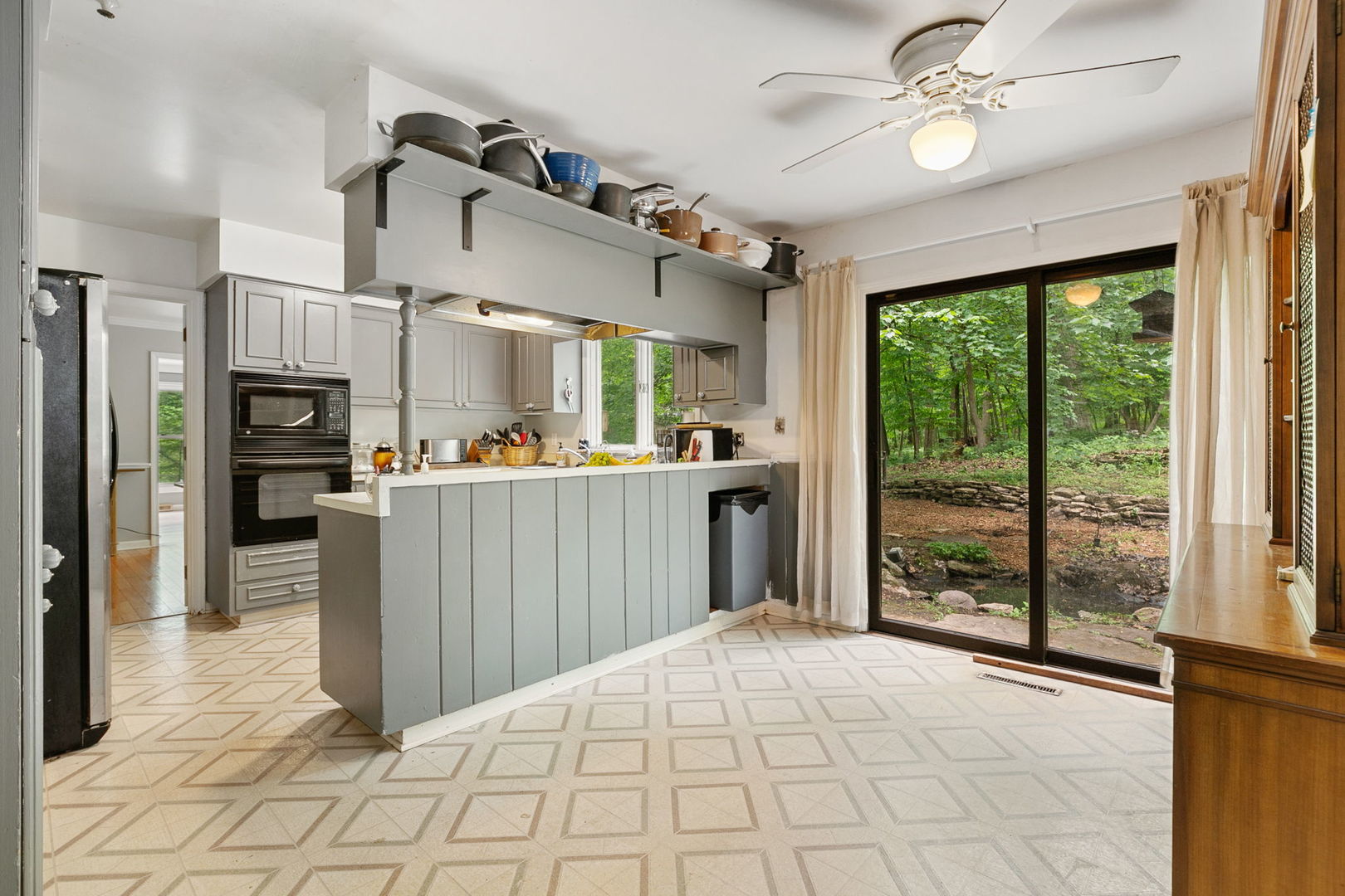 36W525 Wild Rose Road St. Charles, IL 60174 - Photo 8 of 39 a room with stainless steel appliances kitchen island granite countertop furniture and a view of kitchen